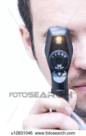 Eye examination View Large Photo Image Stock Photograph - Eye examination. Fotosearch