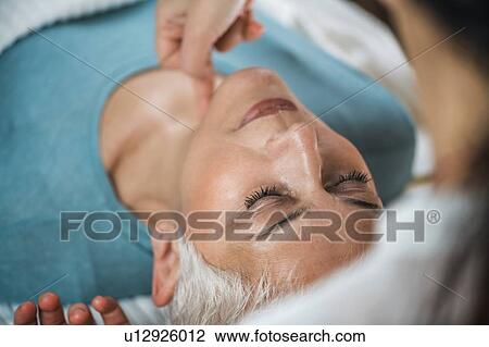 Facial marma therapy, ayurveda neck massage (kanth marma) View Large Photo Image Stock Image - Facial marma therapy, ayurveda neck massage (kanth marma). Fotosearch