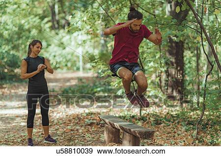 Friends exercising outdoors View Large Photo Image Stock Photo - Friends exercising outdoors. Fotosearch