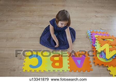 Girl learning abc View Large Photo Image Stock Photo - Girl learning abc. Fotosearch