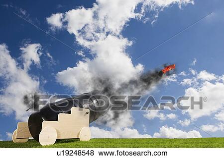 Stock Photo - Human Cannonball launching. Fotosearch