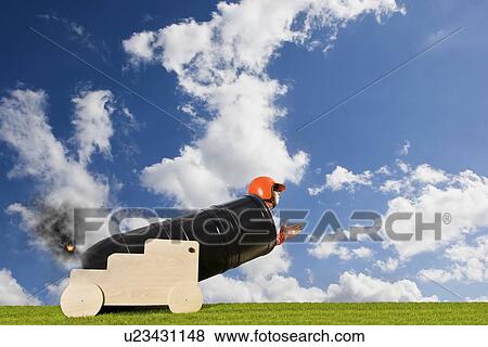 Stock Photo - Human Cannonball. Fotosearch