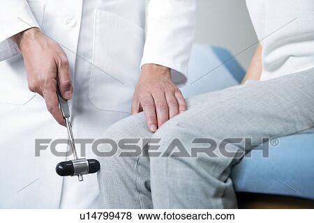 Knee jerk reaction test View Large Photo Image Stock Photo - Knee jerk reaction test. Fotosearch