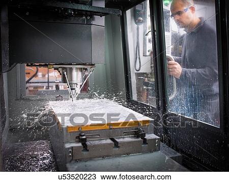 Knife factory worker monitoring machinery in workshop View Large Photo Image Stock Image - Knife factory worker monitoring machinery in workshop. Fotosearch