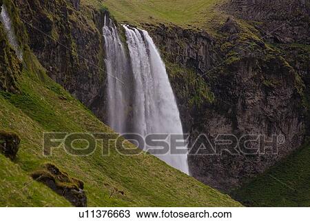 Stock Image - Landscape detail of waterfall, side view, Selfoss, Arnessysla, Iceland. Fotosearch