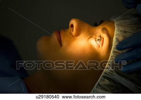 Stock Image - Laser eye surgery. Fotosearch