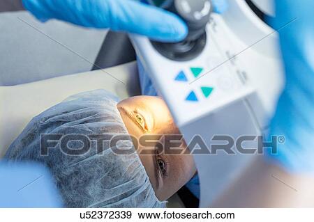 Stock Photo - Laser eye surgery. Fotosearch