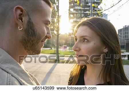 Loving young couple in city, Milano, Lombardia, Italy View Large Photo Image Stock Photo - Loving young couple in city, Milano, Lombardia, Italy. Fotosearch