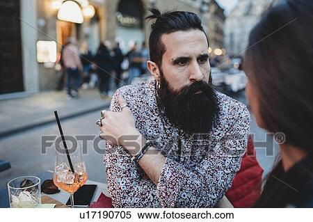 Man gazing intensely into woman's eyes in cafe View Large Photo Image Stock Photography - Man gazing intensely into woman's eyes in cafe. Fotosearch
