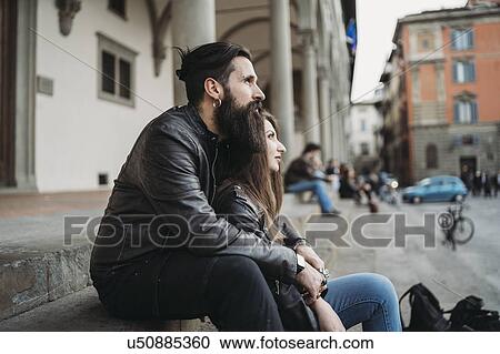 Man hugging woman from behind on steps View Large Photo Image Stock Image - Man hugging woman from behind on steps. Fotosearch