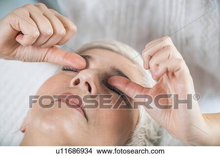 Marma therapy ayurveda eyes treatment urdhaw and adhoakshi View Large Photo Image Picture - Marma therapy ayurveda eyes treatment urdhaw and adhoakshi. Fotosearch