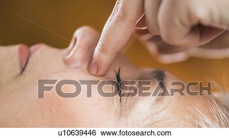 Stock Photograph - Marma therapy ayurveda facial massage. Fotosearch