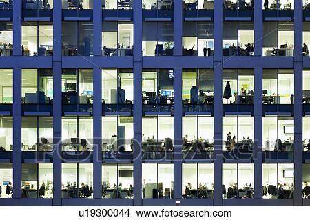 Picture - Modern office block at dusk. Fotosearch