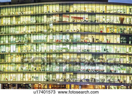 Modern office block at dusk View Large Photo Image Stock Image - Modern office block at dusk. Fotosearch