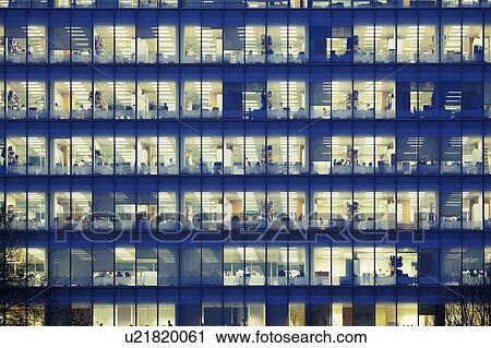 Modern office block at dusk View Large Photo Image Stock Image - Modern office block at dusk. Fotosearch