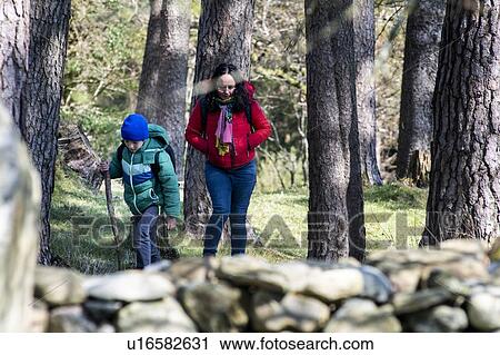 Stock Image - Mother and son exploring national park, Llanaber, Gwynedd, United Kingdom. Fotosearch