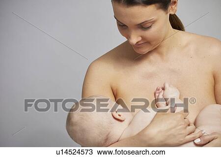 Mother breastfeeding baby boy View Large Photo Image Stock Image - Mother breastfeeding baby boy. Fotosearch