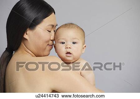 Mother nuzzling baby View Large Photo Image Stock Image - Mother nuzzling baby. Fotosearch