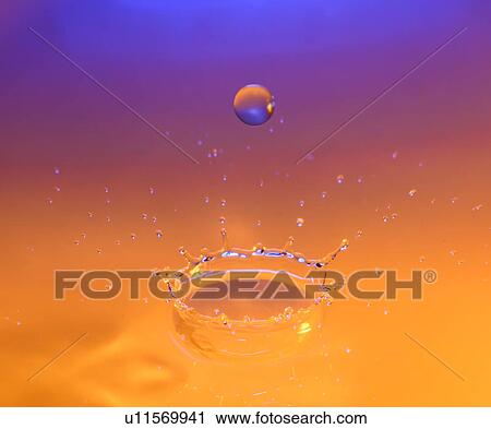 Orange and purple splashing water View Large Photo Image Stock Image - Orange and purple splashing water. Fotosearch