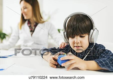 Picture - Paediatric hearing test. Fotosearch