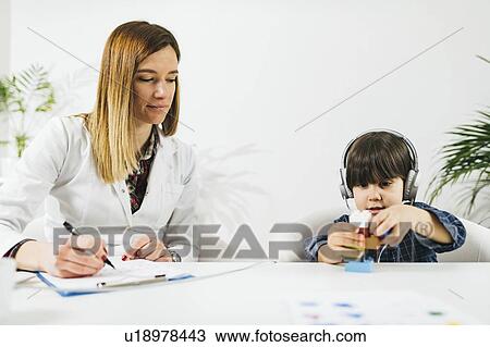 Paediatric hearing test View Large Photo Image Stock Image - Paediatric hearing test. Fotosearch