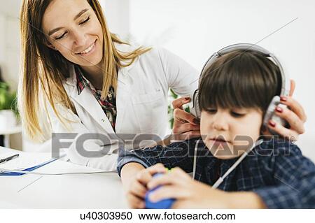 Paediatric hearing test View Large Photo Image Stock Image - Paediatric hearing test. Fotosearch