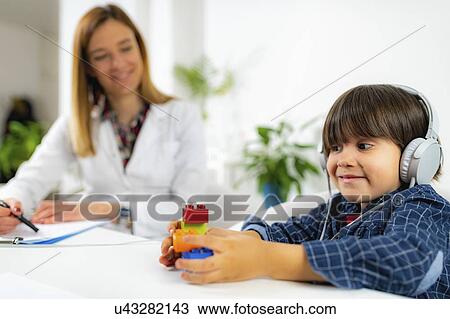 Paediatric hearing test View Large Photo Image Stock Image - Paediatric hearing test. Fotosearch