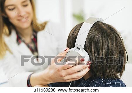 Paediatric hearing test View Large Photo Image Stock Photo - Paediatric hearing test. Fotosearch