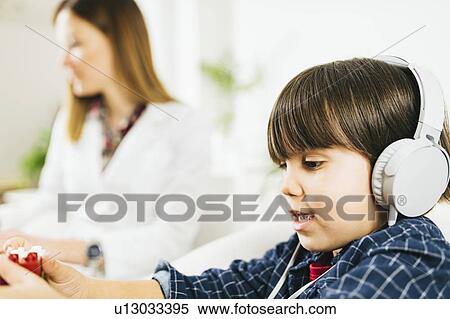 Stock Photography - Paediatric hearing test. Fotosearch