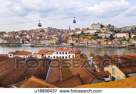 Stock Photo - Port wine cellars at Douro River and Telefrico de Gaia, Porto, Portugal. Fotosearch