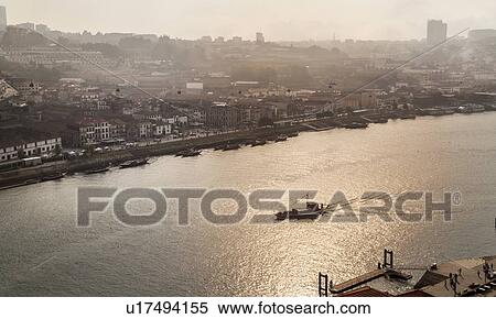 Port wine cellars at Douro River, Porto, Portugal View Large Photo Image Stock Photography - Port wine cellars at Douro River, Porto, Portugal. Fotosearch