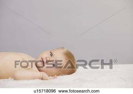 Stock Photograph - Portrait of baby girl. Fotosearch