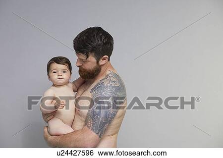 Portrait of father with baby girl View Large Photo Image Stock Photograph - Portrait of father with baby girl. Fotosearch