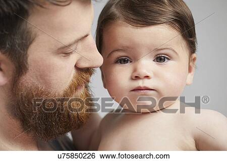 Portrait of father with baby girl View Large Photo Image Stock Photograph - Portrait of father with baby girl. Fotosearch