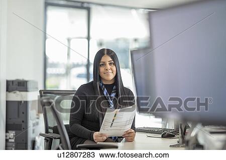 Portrait of female apprentice service advisor in car dealership View Large Photo Image Stock Image - Portrait of female apprentice service advisor in car dealership. Fotosearch