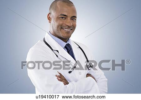 Portrait of male doctor View Large Photo Image Stock Photo - Portrait of male doctor. Fotosearch