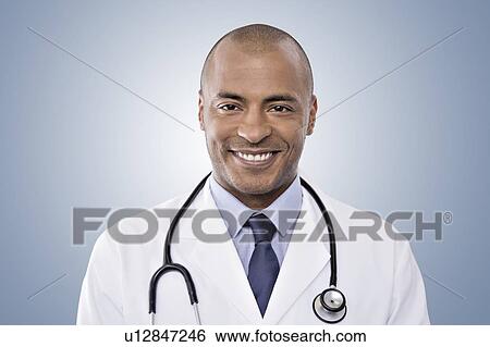 Portrait of male doctor View Large Photo Image Stock Photograph - Portrait of male doctor. Fotosearch
