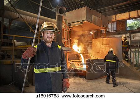 Portrait of metal worker in titanium recycling plant View Large Photo Image Stock Photo - Portrait of metal worker in titanium recycling plant. Fotosearch