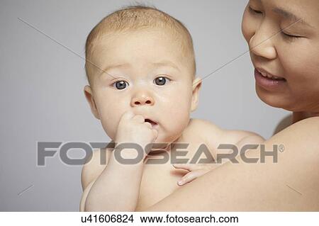 Picture - Portrait of mother and baby boy. Fotosearch