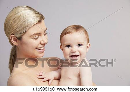 Portrait of mother and baby boy View Large Photo Image Stock Image - Portrait of mother and baby boy. Fotosearch