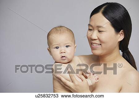 Portrait of mother and baby boy View Large Photo Image Stock Image - Portrait of mother and baby boy. Fotosearch