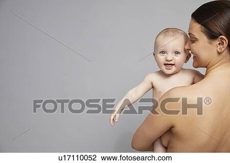 Stock Image - Portrait of mother and baby. Fotosearch
