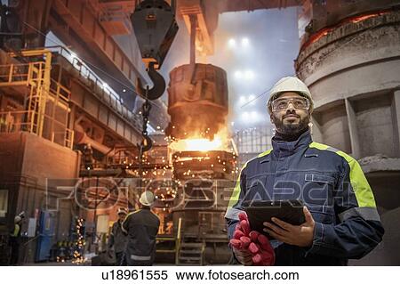 Portrait of steelworker during steel pour in steelworks View Large Photo Image Stock Photography - Portrait of steelworker during steel pour in steelworks. Fotosearch