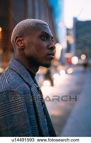 Stock Image - Portrait of stylish man, Milan, Italy. Fotosearch