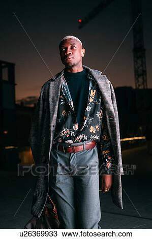 Stock Image - Portrait of stylish man, Milan, Italy. Fotosearch