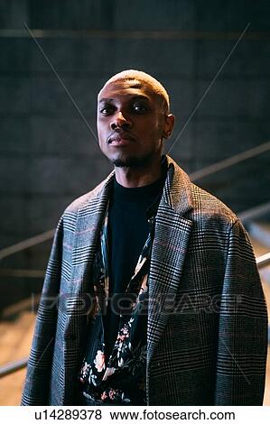 Stock Photo - Portrait of stylish man, Milan, Italy. Fotosearch