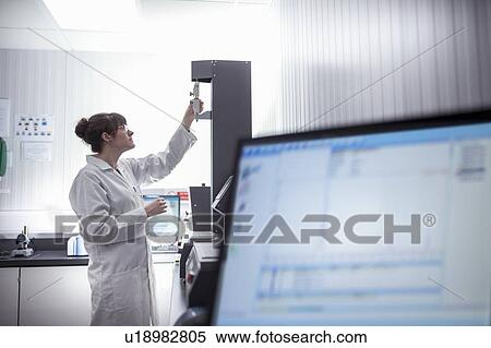 Stock Photography - Print scientist working in print factory. Fotosearch