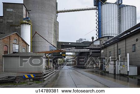 Stock Image - Public road runs through vast cement factory, Slite, Gotlands Lan, Sweden. Fotosearch