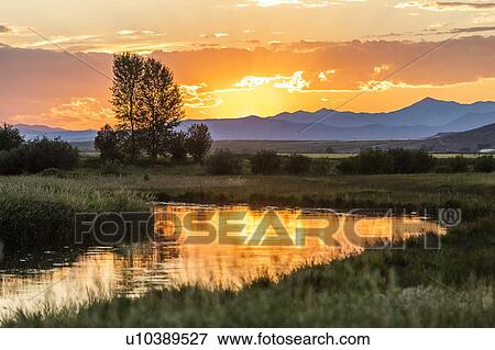 River at sunset in Picabo, Idaho, USA View Large Photo Image Stock Photo - River at sunset in Picabo, Idaho, USA. Fotosearch