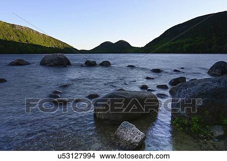 Rocks in Jordan Pond by hills in Acadia National Park, Maine, USA View Large Photo Image Picture - Rocks in Jordan Pond by hills in Acadia National Park, Maine, USA. Fotosearch